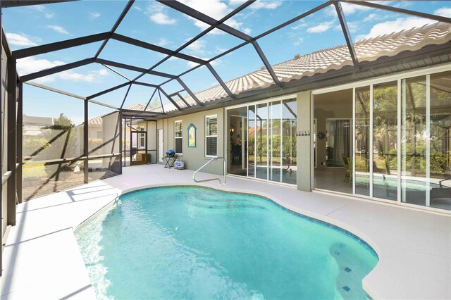1118 Deardon Dr, Venice, FL 34292 - pool featuring glass enclosure and a patio area