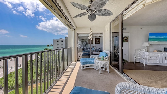 2675 Gulf Of Mexico Dr Unit 403, Longboat Key, FL 34228 - balcony with a water view, ceiling fan, and visible vents