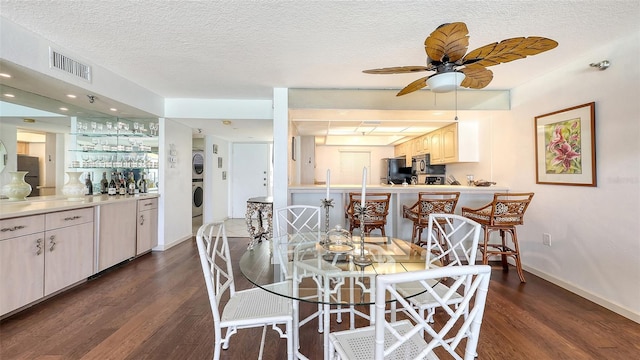 2675 Gulf Of Mexico Dr Unit 403, Longboat Key, FL 34228 - dining area featuring baseboards, dark wood finished floors, ceiling fan, and visible vents