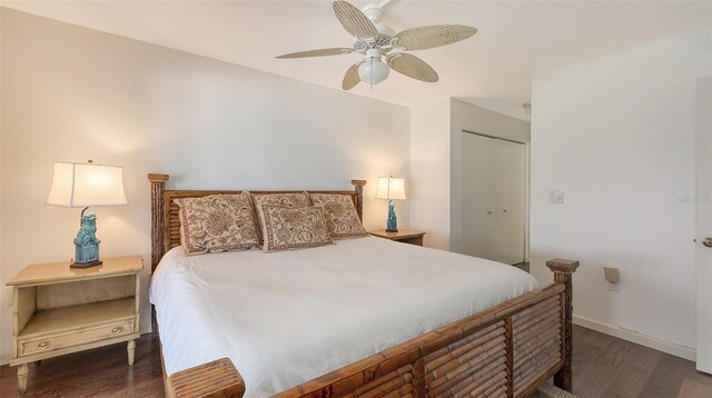 2675 Gulf Of Mexico Dr Unit 403, Longboat Key, FL 34228 - bedroom with baseboards, a ceiling fan, wood finished floors, and a closet