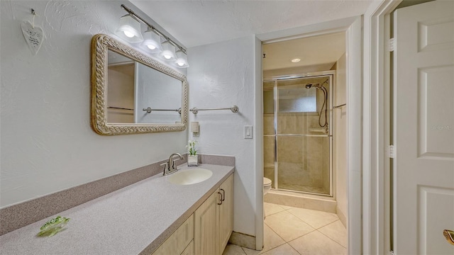 2675 Gulf Of Mexico Dr Unit 403, Longboat Key, FL 34228 - full bath with vanity, tile patterned floors, a stall shower, and toilet