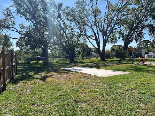 view of yard featuring fence