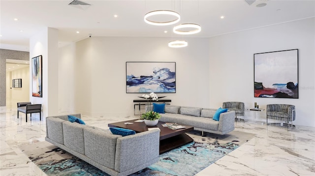 1211 Gulf Of Mexico Dr Unit 309, Longboat Key, FL 34228 - living area featuring marble tiled flooring and recessed lighting