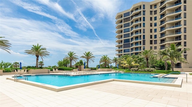1211 Gulf Of Mexico Dr Unit 309, Longboat Key, FL 34228 - community pool featuring a patio