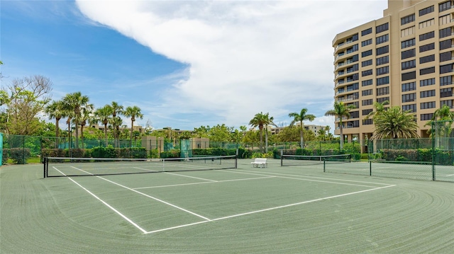 1211 Gulf Of Mexico Dr Unit 309, Longboat Key, FL 34228 - view of tennis court featuring community basketball court