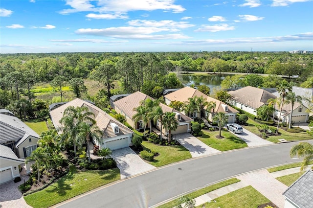 11716 Strandhill Ct, Lakewood Ranch, FL 34202 - aerial view featuring a wooded view, a water view, and a residential view