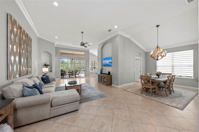 11716 Strandhill Ct, Lakewood Ranch, FL 34202 - living room with light tile patterned flooring, ornamental molding, baseboards, and ceiling fan with notable chandelier