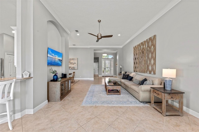 11716 Strandhill Ct, Lakewood Ranch, FL 34202 - tiled living area with recessed lighting, ornamental molding, baseboards, a textured ceiling, and a ceiling fan