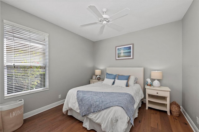 11716 Strandhill Ct, Lakewood Ranch, FL 34202 - bedroom with baseboards, wood finished floors, and ceiling fan