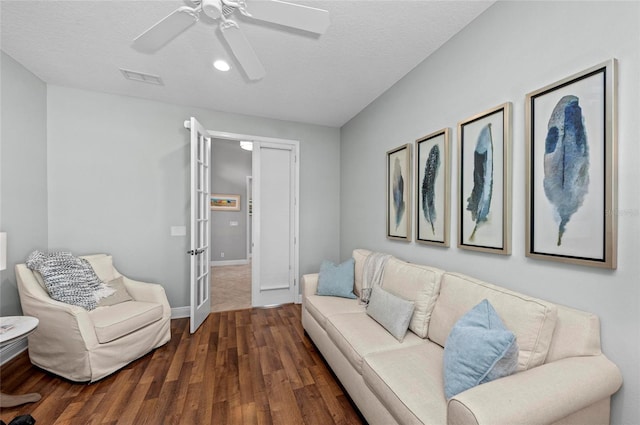 11716 Strandhill Ct, Lakewood Ranch, FL 34202 - living area featuring french doors, baseboards, visible vents, ceiling fan, and wood finished floors