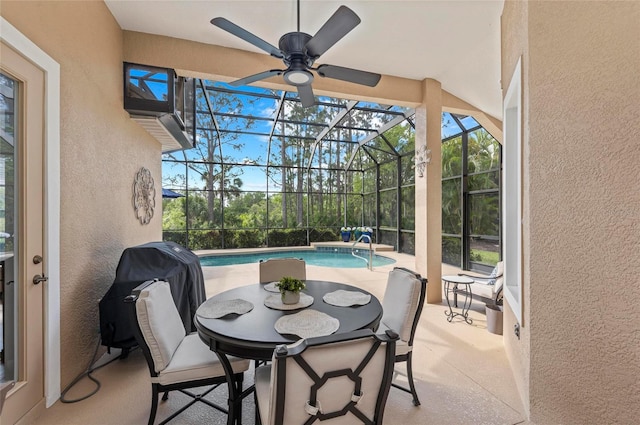 11716 Strandhill Ct, Lakewood Ranch, FL 34202 - sunroom / solarium featuring a swimming pool and a ceiling fan