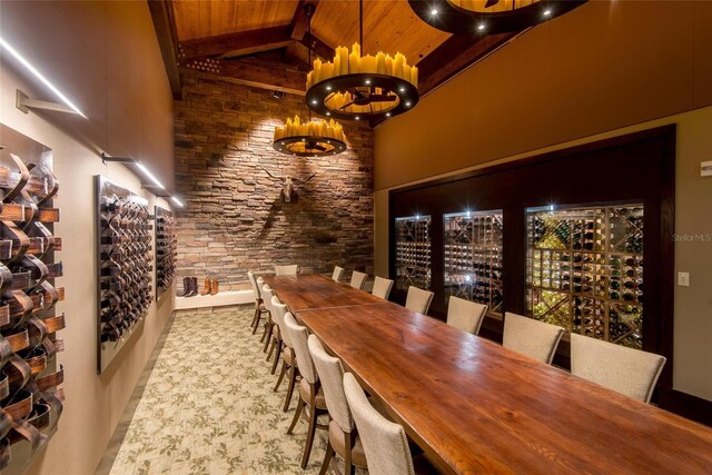 11716 Strandhill Ct, Lakewood Ranch, FL 34202 - wine area featuring high vaulted ceiling, wooden ceiling, beam ceiling, and a chandelier