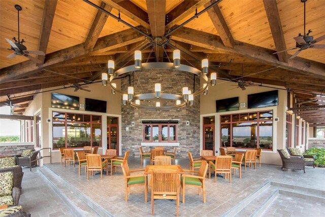 11716 Strandhill Ct, Lakewood Ranch, FL 34202 - dining room with beamed ceiling, high vaulted ceiling, wooden ceiling, and a ceiling fan