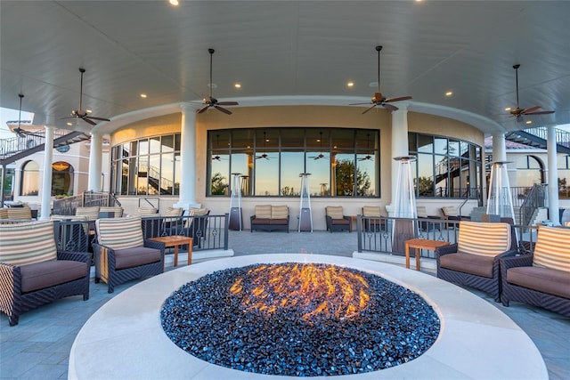 11716 Strandhill Ct, Lakewood Ranch, FL 34202 - view of patio / terrace featuring a fire pit