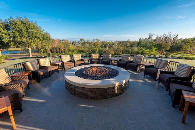 11716 Strandhill Ct, Lakewood Ranch, FL 34202 - view of patio / terrace with an outdoor fire pit