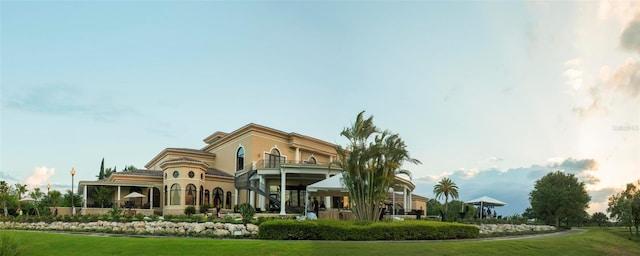 11716 Strandhill Ct, Lakewood Ranch, FL 34202 - exterior space with a balcony and a lawn