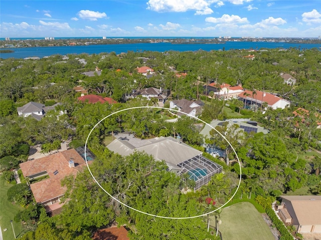 bird's eye view with a water view and a residential view