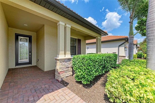 10015 Marbella Dr, Bradenton, FL 34211 - doorway to property featuring stucco siding