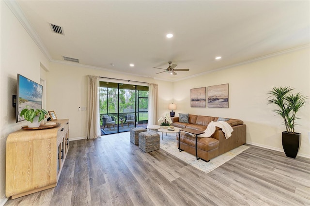 10015 Marbella Dr, Bradenton, FL 34211 - living room featuring wood finished floors, a ceiling fan, crown molding, and recessed lighting