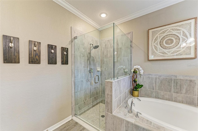 10015 Marbella Dr, Bradenton, FL 34211 - bathroom featuring a garden tub, a stall shower, ornamental molding, and a textured wall