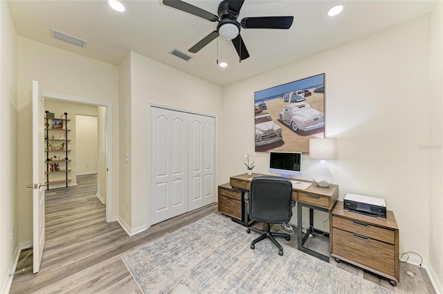 10015 Marbella Dr, Bradenton, FL 34211 - home office with wood finished floors, ceiling fan, and recessed lighting