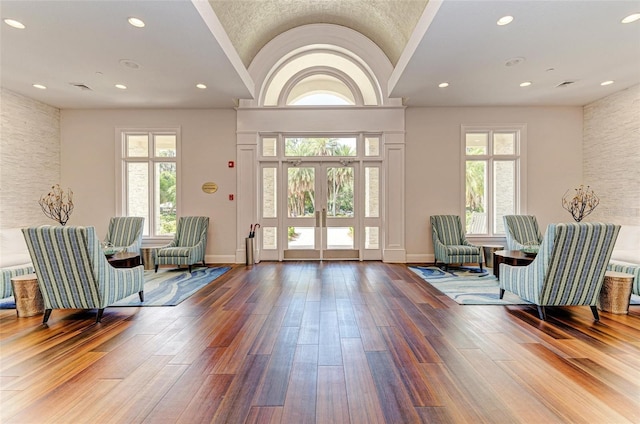 10015 Marbella Dr, Bradenton, FL 34211 - living area featuring wood finished floors, recessed lighting, and lofted ceiling