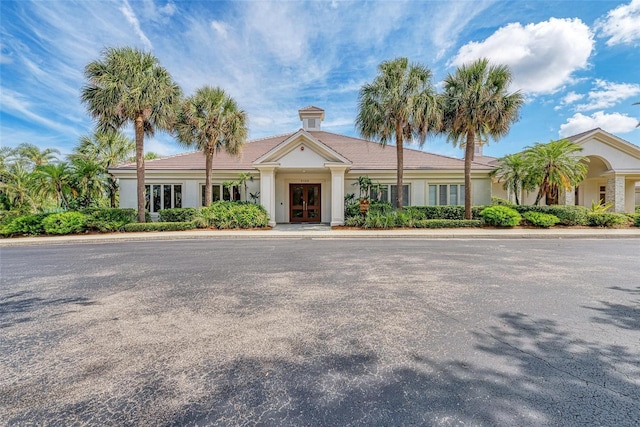 10015 Marbella Dr, Bradenton, FL 34211 - view of front facade featuring french doors and stucco siding