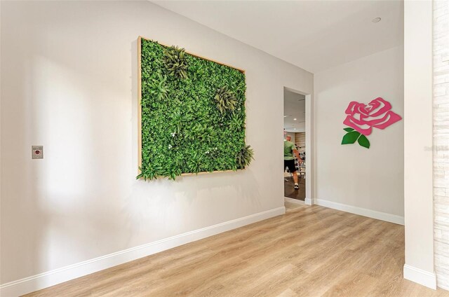 10015 Marbella Dr, Bradenton, FL 34211 - spare room featuring light wood finished floors and baseboards