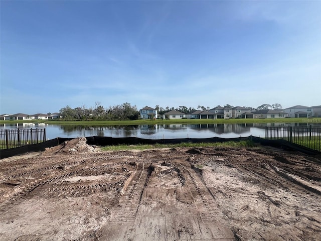 8760 Windlass Cv, Parrish, FL 34219 - water view featuring nearby suburban area and fence