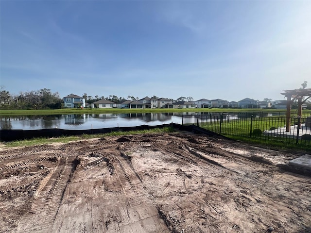 8760 Windlass Cv, Parrish, FL 34219 - water view featuring fence and nearby suburban area