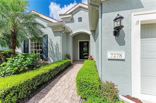 7278 Lismore Ct, Lakewood Ranch, FL 34202 - property entrance featuring stucco siding
