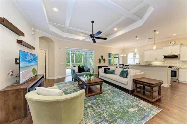 7278 Lismore Ct, Lakewood Ranch, FL 34202 - living area featuring ceiling fan, healthy amount of natural light, dark wood-type flooring, beamed ceiling, and coffered ceiling