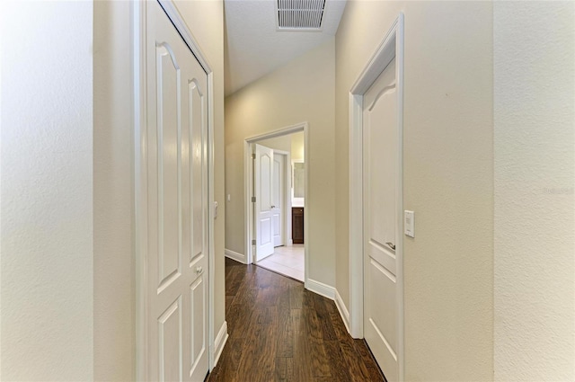 7278 Lismore Ct, Lakewood Ranch, FL 34202 - corridor with dark wood finished floors and baseboards