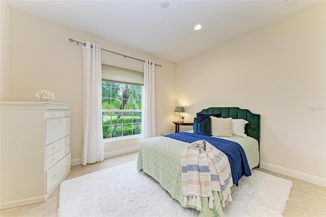 7278 Lismore Ct, Lakewood Ranch, FL 34202 - bedroom with light tile patterned flooring, baseboards, and recessed lighting