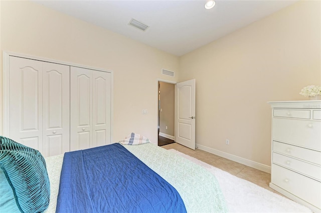 7278 Lismore Ct, Lakewood Ranch, FL 34202 - bedroom featuring a closet, baseboards, light tile patterned flooring, and recessed lighting