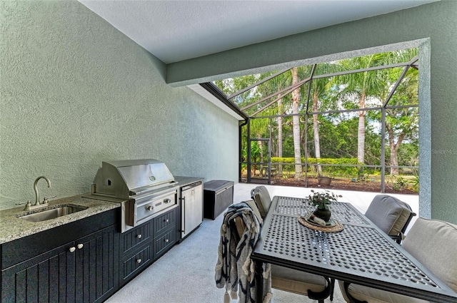 7278 Lismore Ct, Lakewood Ranch, FL 34202 - view of patio / terrace with a sink, a lanai, and outdoor dining space