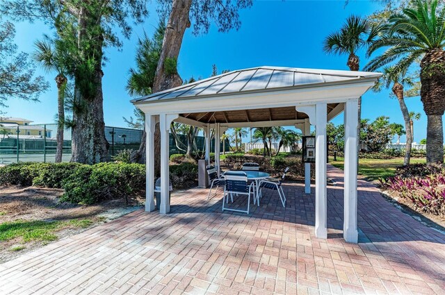 5055 Gulf Of Mexico Dr Unit 422, Longboat Key, FL 34228 - view of patio featuring a gazebo and fence