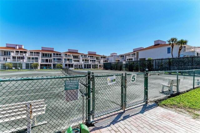 5055 Gulf Of Mexico Dr Unit 422, Longboat Key, FL 34228 - view of tennis court featuring fence and a gate