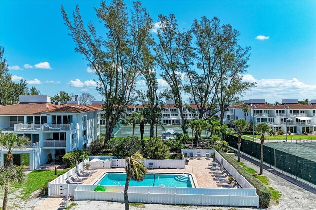 5055 Gulf Of Mexico Dr Unit 422, Longboat Key, FL 34228 - pool featuring a residential view, fence private yard, and a patio area