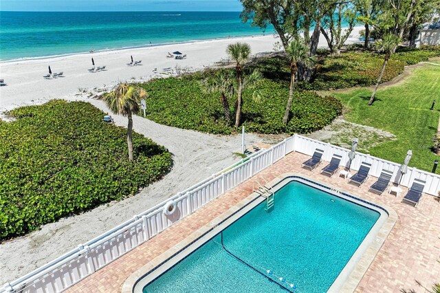5055 Gulf Of Mexico Dr Unit 422, Longboat Key, FL 34228 - community pool featuring fence, a patio, a view of the beach, and a water view