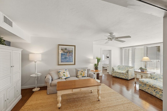 5055 Gulf Of Mexico Dr Unit 422, Longboat Key, FL 34228 - living room featuring ceiling fan, baseboards, wood finished floors, and visible vents