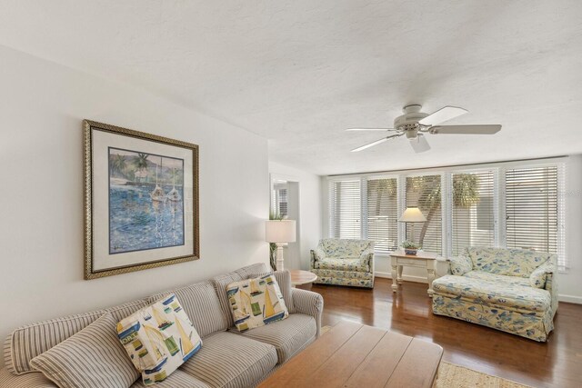 5055 Gulf Of Mexico Dr Unit 422, Longboat Key, FL 34228 - living area with a ceiling fan and wood finished floors