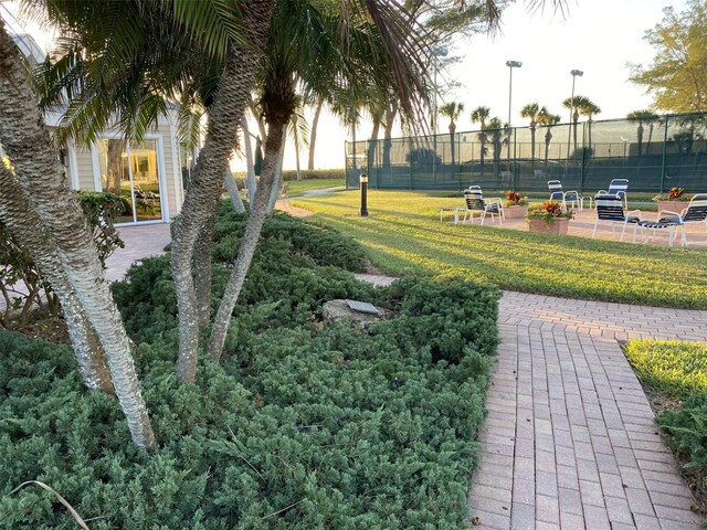 5055 Gulf Of Mexico Dr Unit 422, Longboat Key, FL 34228 - surrounding community with a yard, fence, and a patio