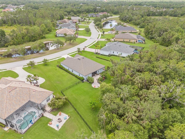 2707 162nd Ave E, Parrish, FL 34219 - aerial view of residential area featuring a large body of water and a heavily wooded area
