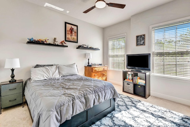 2707 162nd Ave E, Parrish, FL 34219 - bedroom with carpet floors, baseboards, and ceiling fan