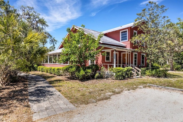 2707 162nd Ave E, Parrish, FL 34219 - view of side of home featuring covered porch