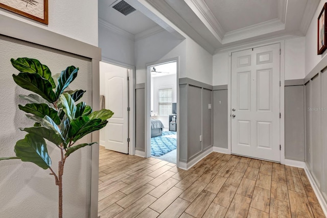 2707 162nd Ave E, Parrish, FL 34219 - entrance foyer with light wood-style floors and ornamental molding