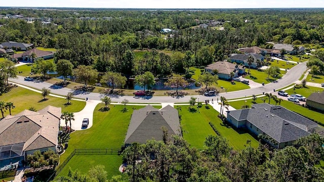 2707 162nd Ave E, Parrish, FL 34219 - aerial perspective of suburban area featuring a heavily wooded area
