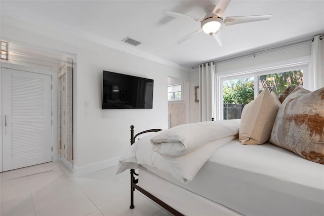 527 Key Royale Dr, Holmes Beach, FL 34217 - bedroom with crown molding, visible vents, baseboards, and a ceiling fan
