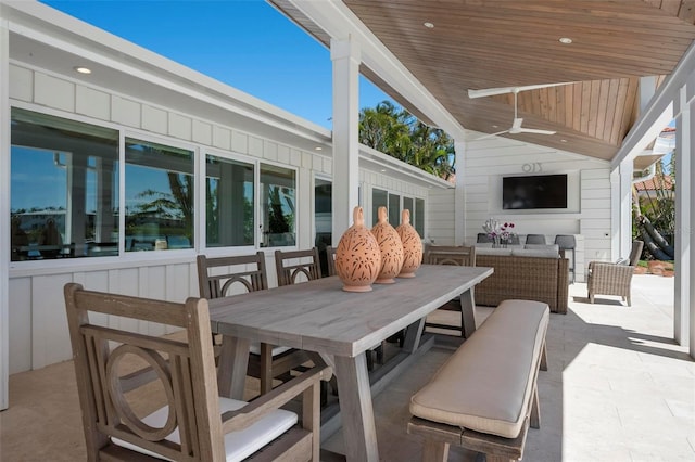 527 Key Royale Dr, Holmes Beach, FL 34217 - view of patio / terrace with an outdoor living space, ceiling fan, and outdoor dining area